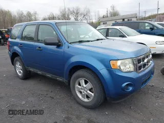 2010 Ford Escape XLS with VIN 1FMCU9C7XAKD27988, listed as a IAAI auction lot 42071415 with 130,176 mi miles and . Bid and sale history available at DreamBid. Image 1.