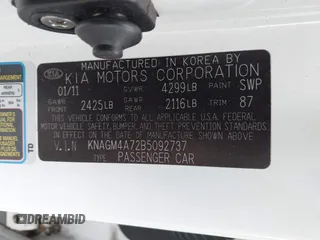 2011 Kia Optima LX z VIN KNAGM4A72B5092737, wystawiony jako IAAI lot #42321978 z przebiegiem 183 742 mil mil oraz . Historia ofert i sprzedaży dostępna na DreamBid. Obrazek 9.