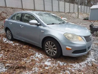 2010 Suzuki Kizashi SE with VIN JS2RE9A30A6101436, listed as a IAAI auction lot 40998132 with 140,786 mi miles and . Bid and sale history available at DreamBid. Image 1.