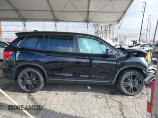 2019 Honda Passport Sport z VIN 5FNYF7H29KB010241, wystawiony jako IAAI lot #41935605 z przebiegiem 84 029 mil mil oraz . Historia ofert i sprzedaży dostępna na DreamBid. Obrazek 13.