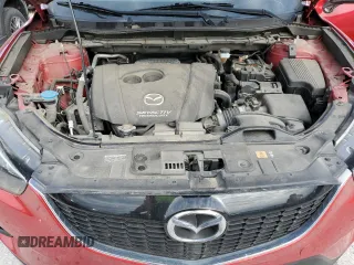 2014 Mazda CX-5 Touring with VIN JM3KE2CY6E0316041, listed as a Copart auction lot 52227835 with 69,921 mi miles and Salvage Title. Bid and sale history available at DreamBid. Image 12.