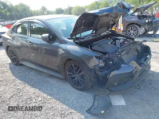 2023 Subaru WRX Premium z VIN JF1VBAF61P9801744, wystawiony jako IAAI lot #42603973 z przebiegiem 47 995 mil mil oraz . Historia ofert i sprzedaży dostępna na DreamBid. Obrazek 1.