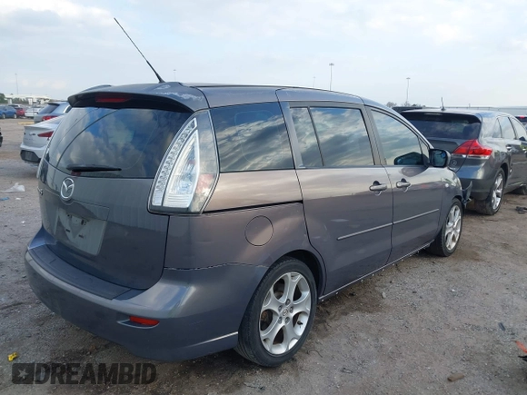 2009 Mazda 5 Sport with VIN JM1CR29L990341261, listed as a IAAI auction lot 41522567 with 123,465 mi miles and . Bid and sale history available at DreamBid. Image 4.