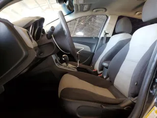 2015 Chevrolet Cruze LS z VIN 1G1PA5SG2F7119146, wystawiony jako Copart lot #55622605 z przebiegiem 133 688 mil mil oraz Szkoda całkowita • Salvage title. Historia ofert i sprzedaży dostępna na DreamBid. Obrazek 7.
