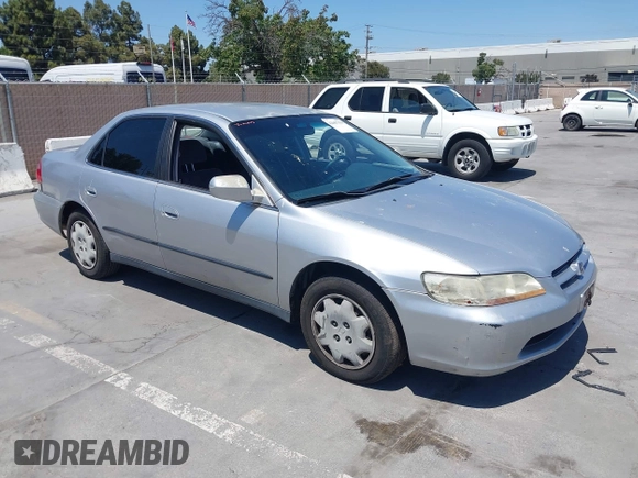 1999 Honda Accord LX with VIN JHMCG665XXC033464, listed as a IAAI auction lot 42687150 with 194,076 mi miles and . Bid and sale history available at DreamBid. Image 1.
