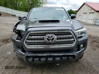 2017 Toyota Tacoma SR5 z VIN 3TMDZ5BN6HM017990, wystawiony jako Copart lot #57982205 z przebiegiem 51 890 mil mil oraz Szkoda całkowita • Salvage title. Historia ofert i sprzedaży dostępna na DreamBid. Obrazek 5.