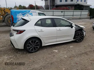 2019 Toyota Corolla Hatchback SE with VIN JTNK4RBEXK3051691, listed as a Copart auction lot 77159164 with 21,051 mi miles and Salvage Title. Bid and sale history available at carsss.com. Image 3.