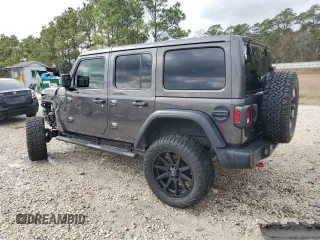 2018 Jeep Wrangler Unlimited Rubicon with VIN 1C4HJXFN9JW249214, listed as a Copart auction lot 42692175 with 161,157 mi miles and Salvage title. Bid and sale history available at DreamBid. Image 2.