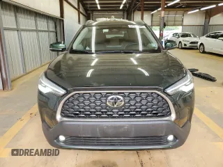 2023 Toyota Corolla Cross XLE с VIN 7MUDAABG2PV060339, выставлен на аукционе Copart как лот 57308605 с пробегом 15 103 миль миль и Списание • Salvage title. История ставок и продаж доступна на DreamBid. Изображение 5.