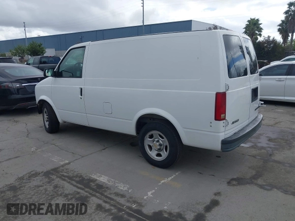 2005 Chevrolet Astro Cargo Van with VIN 1GCDM19X65B125902, listed as a IAAI auction lot 41896346 with 128,598 mi miles. Bid and sale history available at carsss.com. Image 3.