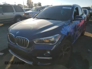 2017 BMW X1 sDrive28i with VIN WBXHU7C3XH5H37412, listed as a Copart auction lot 71733512 with 0 mi miles. Bid and sale history available at carsss.com. Image 1.
