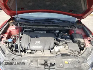 2016 Mazda CX-5 Grand Touring z VIN JM3KE2DY0G0722334, wystawiony jako Copart lot #59998185 z przebiegiem 51 449 mil mil oraz Szkoda całkowita • Salvage title. Historia ofert i sprzedaży dostępna na DreamBid. Obrazek 12.