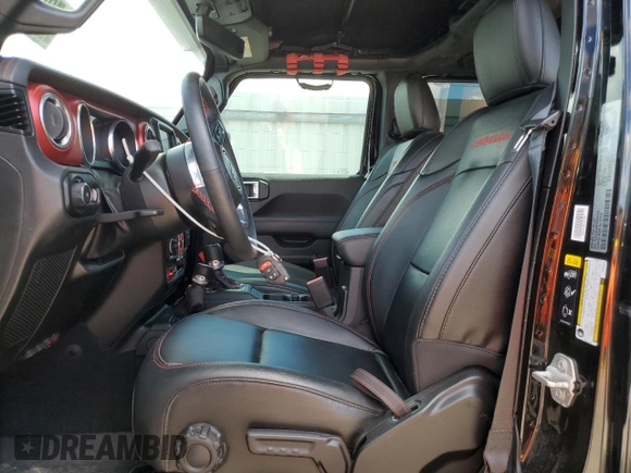 2023 Jeep Wrangler Rubicon with VIN 1C4HJXFG3PW682375, listed as a Copart auction lot 73969434 with Not provided miles and Salvage title. Bid and sale history available at DreamBid. Image 7.