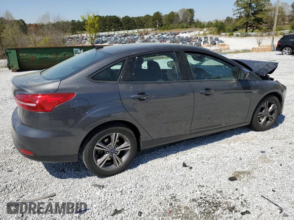 2018 Ford Focus SE with VIN 1FADP3FE9JL278340, listed as a Copart auction lot 50839345 with 83,187 mi miles and Salvage title. Bid and sale history available at DreamBid. Image 3.