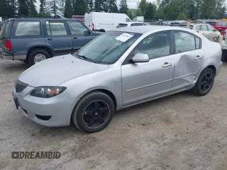 2006 Mazda 3 i Touring with VIN JM1BK32F261444957, listed as a IAAI auction lot 42207822 with 222,142 mi miles and . Bid and sale history available at DreamBid. Image 2.