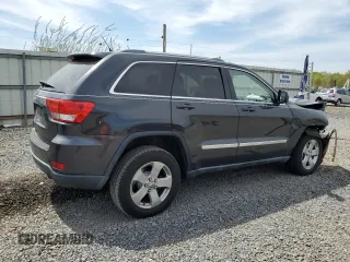 2011 Jeep Grand Cherokee Laredo z VIN 1J4RR4GG8BC738468, wystawiony jako Copart lot #54907215 z przebiegiem 182 576 mil mil oraz Szkoda całkowita • Salvage title. Historia ofert i sprzedaży dostępna na DreamBid. Obrazek 3.