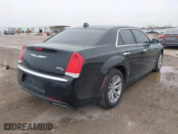 2016 Chrysler 300 with VIN 2C3CCAEG5GH333935, listed as a IAAI auction lot 41433834 with 131,524 mi miles. Bid and sale history available at carsss.com. Image 4.