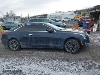 2016 Cadillac ATS Coupe Luxury Collection AWD with VIN 1G6AH1RX2G0125405, listed as a IAAI auction lot 41429998 with 69,365 mi miles. Bid and sale history available at carsss.com. Image 13.