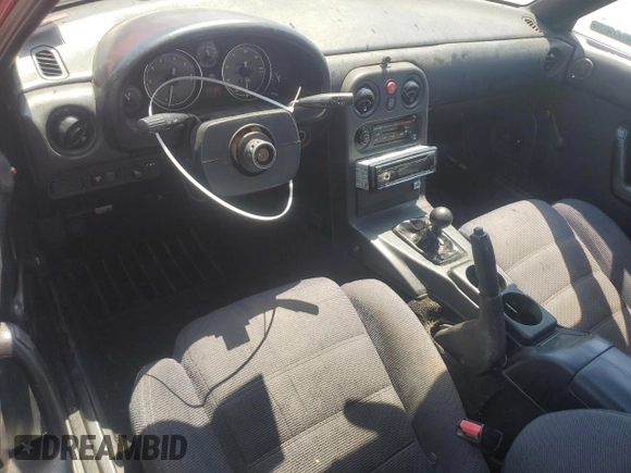 1993 Mazda MX-5 Miata z VIN JM1NA3511P0406871, wystawiony jako Copart lot #62239125 z przebiegiem 217 379 mil mil oraz Szkoda całkowita • Salvage title. Historia ofert i sprzedaży dostępna na DreamBid. Obrazek 8.