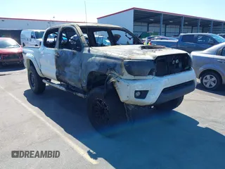 2014 Toyota Tacoma with VIN 5TFLU4EN0EX098815, listed as a IAAI auction lot 41675606 with 89,365 mi miles. Bid and sale history available at carsss.com. Image 1.