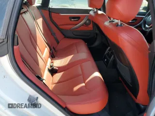 2019 BMW 4 Series 430i xDrive z VIN WBA4J3C56KBL05093, wystawiony jako Copart lot #52215335 z przebiegiem 55 900 mil mil oraz Szkoda całkowita • Salvage title. Historia ofert i sprzedaży dostępna na DreamBid. Obrazek 10.