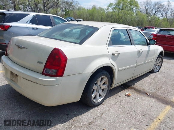 2006 Chrysler 300 with VIN 2C3LA43R16H250237, listed as a IAAI auction lot 42002745 with 157,911 mi miles. Bid and sale history available at carsss.com. Image 4.