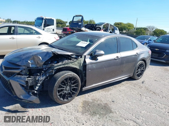 2019 Toyota Camry XSE with VIN 4T1B61HK3KU770042, listed as a IAAI auction lot 41840898 with 101,957 mi miles. Bid and sale history available at carsss.com. Image 6.