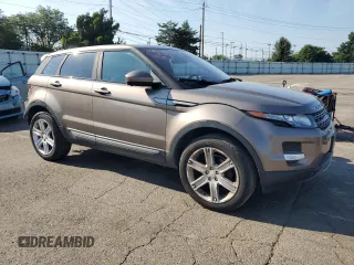 2015 Land Rover Range Rover Evoque Pure Plus with VIN SALVP2BG5FH012672, listed as a Copart auction lot 63249055 with 122,693 mi miles and Salvage title. Bid and sale history available at DreamBid. Image 4.