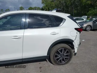 2018 Mazda CX-5 Grand Touring with VIN JM3KFBDM6J0451605, listed as a IAAI auction lot 42099182 with 81,703 mi miles and . Bid and sale history available at DreamBid. Image 6.