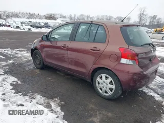 2010 Toyota Yaris with VIN JTDKT4K34A5291847, listed as a IAAI auction lot 41562243 with 182,067 mi miles. Bid and sale history available at carsss.com. Image 3.