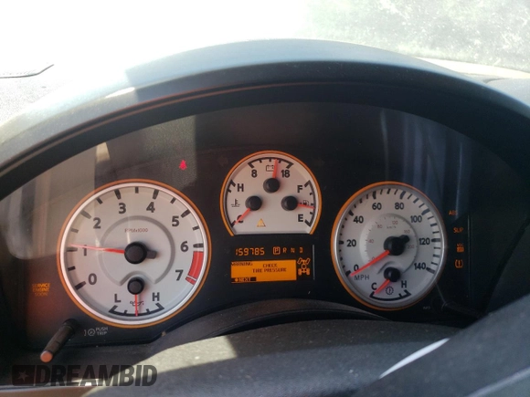 2011 Nissan Titan SL with VIN 1N6BA0ECXBN322611, listed as a Copart auction lot 63002925 with 159,785 mi miles and Salvage title. Bid and sale history available at DreamBid. Image 9.