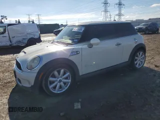 2010 MINI Hardtop S with VIN WMWMF7C52ATZ71627, listed as a Copart auction lot 46712635 with 74,842 mi miles and Salvage Title. Bid and sale history available at DreamBid. Image 1.