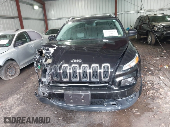 2014 Jeep Cherokee Latitude with VIN 1C4PJLCS2EW116959, listed as a IAAI auction lot 41926058 with 69,280 mi miles. Bid and sale history available at carsss.com. Image 12.