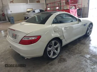 2012 Mercedes-Benz SLK-Class SLK 350 with VIN WDDPK5HA7CF033281, listed as a IAAI auction lot 41446225 with 99,518 mi miles. Bid and sale history available at carsss.com. Image 4.