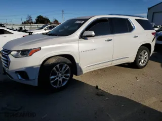 2018 Chevrolet Traverse High Country with VIN 1GNEVKKW0JJ139343, listed as a Copart auction lot 87722385 with 128,143 mi miles and Salvage Title. Bid and sale history available at carsss.com. Image 1.