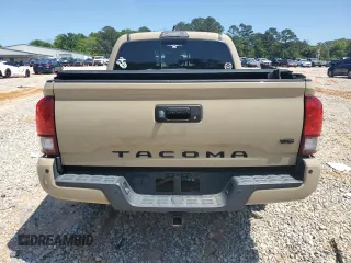 2018 Toyota Tacoma SR with VIN 3TMCZ5AN4JM183590, listed as a Copart auction lot 51714455 with 102,757 mi miles and Salvage Title. Bid and sale history available at DreamBid. Image 6.