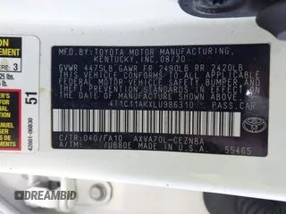 2020 Toyota Camry LE with VIN 4T1C11AKXLU986310, listed as a IAAI auction lot 40977100 with 108,208 mi miles and . Bid and sale history available at DreamBid. Image 9.
