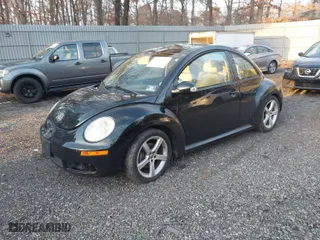 2010 Volkswagen New Beetle Coupe with VIN 3VWRG3AG9AM013681, listed as a IAAI auction lot 41177108 with 104,139 mi miles. Bid and sale history available at carsss.com. Image 2.