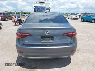 2019 Volkswagen Jetta S z VIN 3VWC57BUXKM061537, wystawiony jako IAAI lot #42170921 z przebiegiem 88 476 mil mil oraz . Historia ofert i sprzedaży dostępna na DreamBid. Obrazek 16.