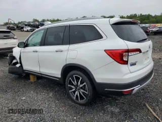 2021 Honda Pilot Elite with VIN 5FNYF6H01MB057789, listed as a Copart auction lot 58543815 with 60,602 mi miles and Salvage title. Bid and sale history available at DreamBid. Image 2.