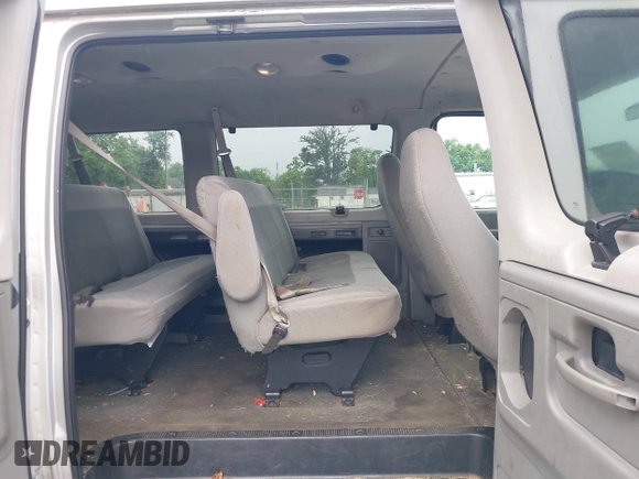 2006 Ford Econoline Passenger XL z VIN 1FBNE31L26DB31891, wystawiony jako IAAI lot #42535613 z przebiegiem 160 095 mil mil oraz . Historia ofert i sprzedaży dostępna na DreamBid. Obrazek 8.