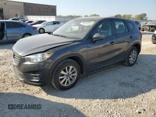 2016 Mazda CX-5 Sport with VIN JM3KE2BE7G0739544, listed as a Copart auction lot 75557244 with 128,336 mi miles and Salvage Title. Bid and sale history available at carsss.com. Image 1.