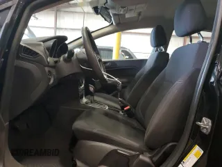2018 Ford Fiesta SE z VIN 3FADP4BJ9JM114755, wystawiony jako Copart lot #58385855 z przebiegiem 42 173 mil mil oraz Szkody całkowita. Historia ofert i sprzedaży dostępna na DreamBid. Obrazek 7.