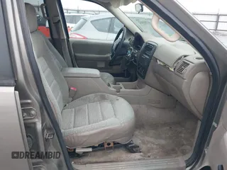 2003 Ford Explorer XLS z VIN 1FMZU72K63UA13640, wystawiony jako IAAI lot #41169432 z przebiegiem 212 849 mil mil oraz . Historia ofert i sprzedaży dostępna na DreamBid. Obrazek 5.