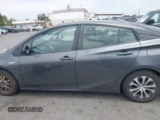 2021 Toyota Prius LE with VIN JTDKAMFP0M3193305, listed as a IAAI auction lot 42283494 with 322,523 mi miles and . Bid and sale history available at DreamBid. Image 14.