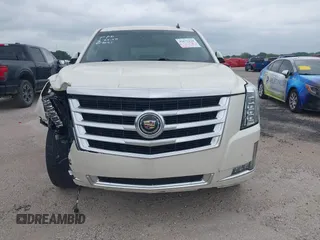2015 Cadillac Escalade Premium z VIN 1GYS4CKJ4FR216873, wystawiony jako IAAI lot #41677234 z przebiegiem 128 990 mil mil oraz . Historia ofert i sprzedaży dostępna na DreamBid. Obrazek 12.