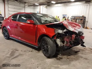 2016 Scion tC with VIN JTKJF5C71GJ025933, listed as a IAAI auction lot 41829097 with 89,728 mi miles. Bid and sale history available at carsss.com. Image 1.