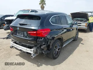 2021 BMW X1 sDrive28i with VIN WBXJG7C0XM5T45715, listed as a IAAI auction lot 42014499 with 23,793 mi miles and . Bid and sale history available at DreamBid. Image 4.