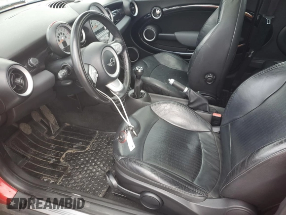 2009 MINI Hardtop with VIN WMWMF33509TU73771, listed as a Copart auction lot 51156025 with 119,622 mi miles and Salvage Title. Bid and sale history available at DreamBid. Image 7.