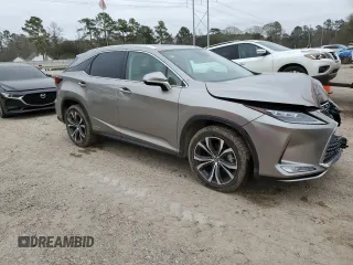 2020 Lexus RX with VIN 2T2HGMDA6LC043854, listed as a Copart auction lot 43705705 with 39,700 mi miles and Salvage Title. Bid and sale history available at carsss.com. Image 4.
